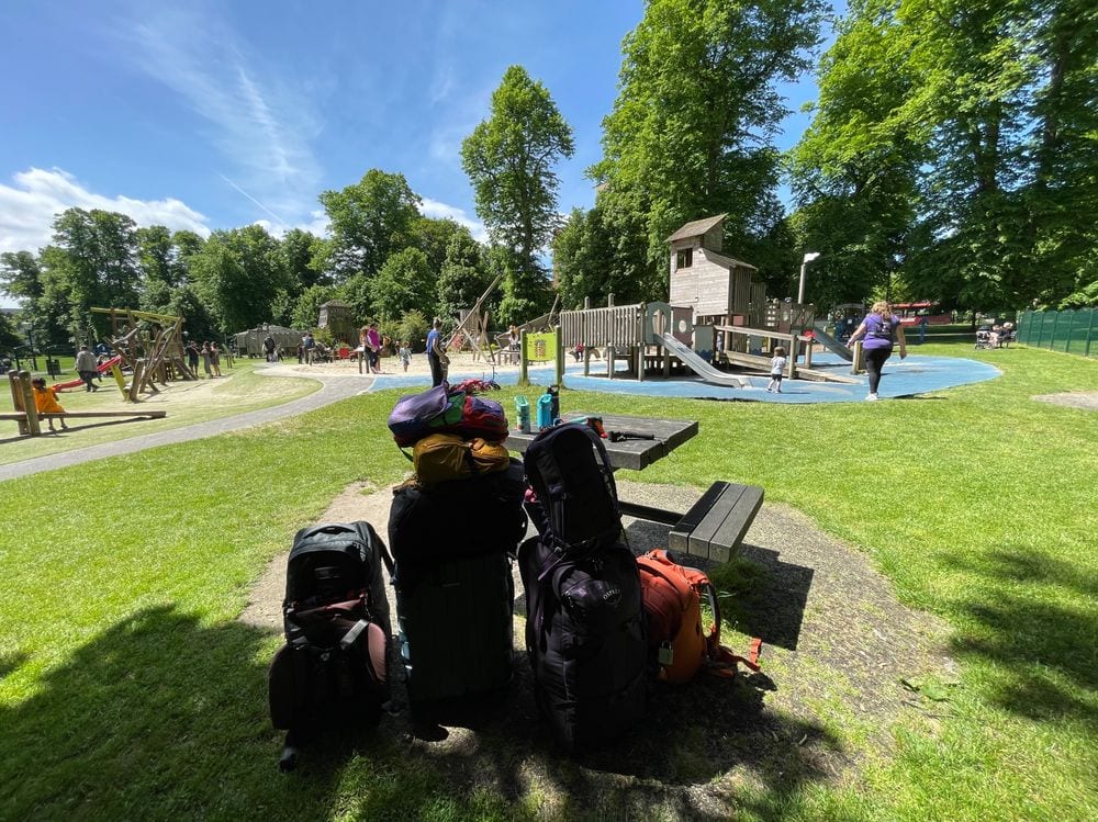 St Mary's playground in Southampton with family bags at a picnic table in the foreground
