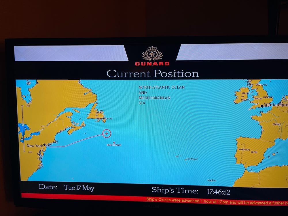 The Queen Mary 2 ship position screen showing the vessel passing over the Titanic wreck site in the North Atlantic