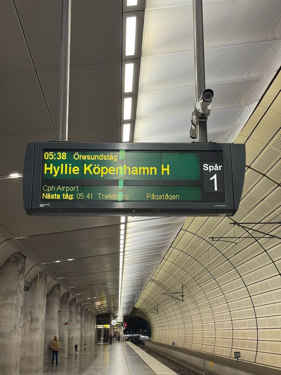 A departure board sign showing the 5:38 Øresundstog service to Copenhagen at Malmö Central station