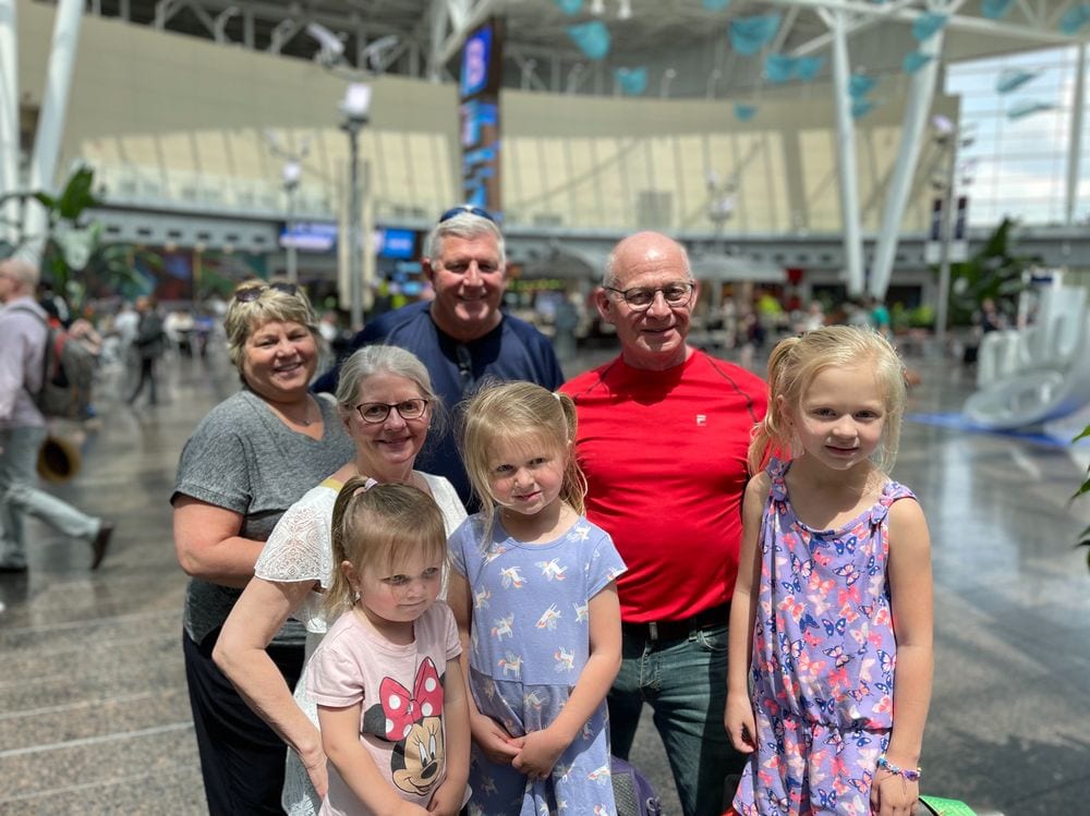 Grandparents and family gathered at Indianapolis airport for a farewell send-off on the first day of full-time travel
